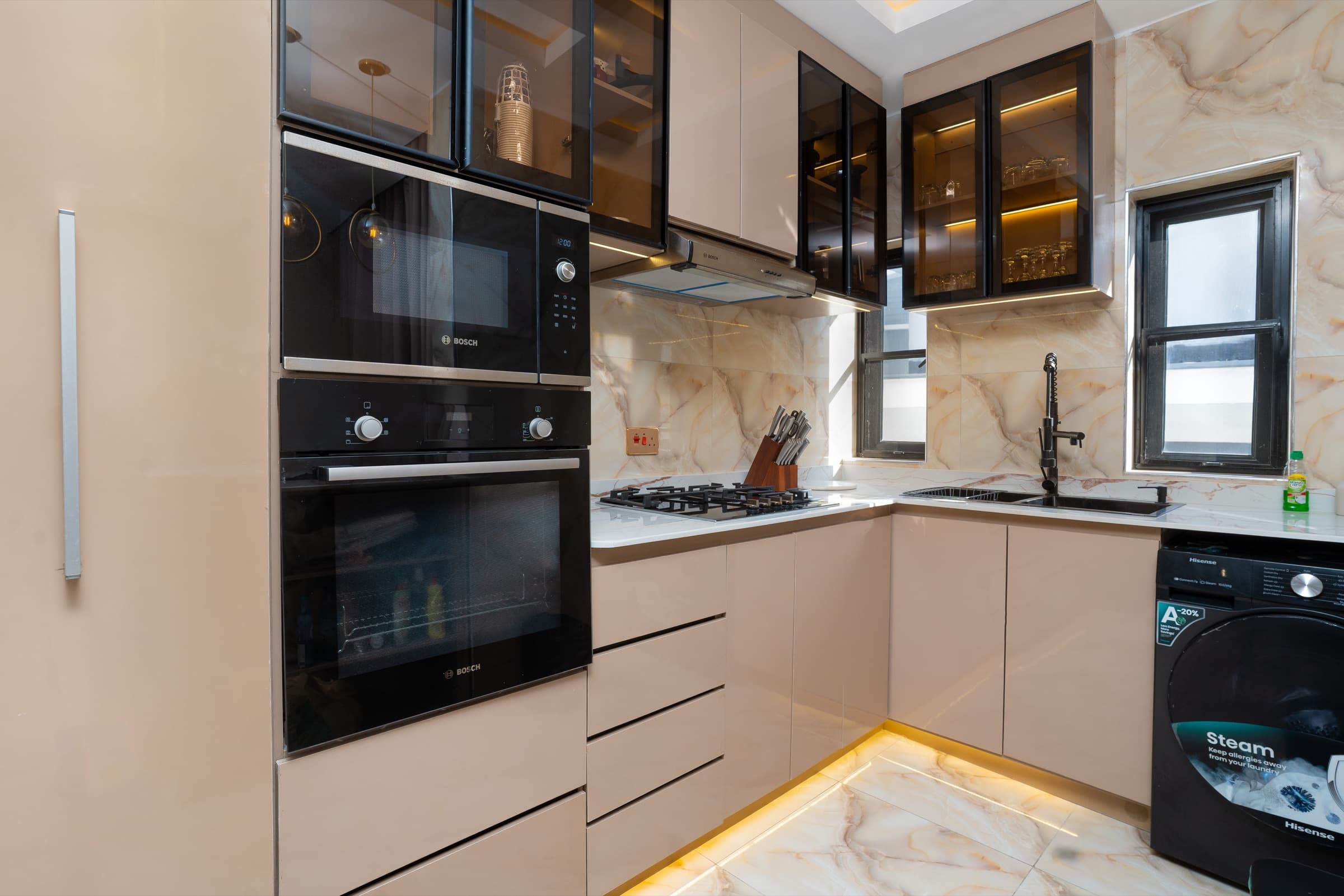 Kitchen counter and marble backsplash at Yordson Apartments